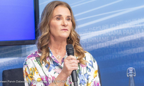 Photograph of Melinda French Gates holding a microphone